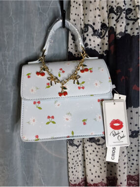 Light blue small cherry-print bag from brand Blush Crush NWT